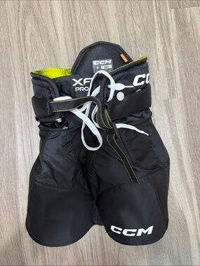 CCM Black Hockey Pants with Neon Yellow Accents